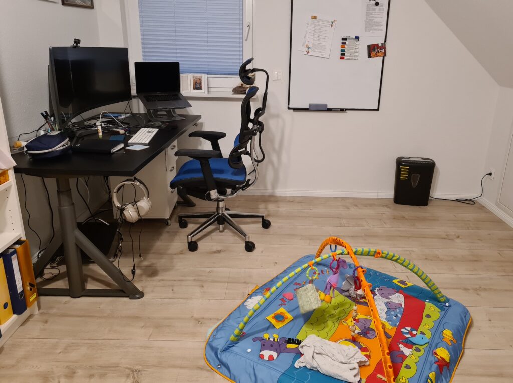 Office room with baby toys